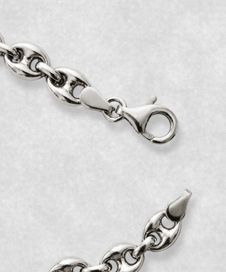 Close-up of 925 sterling silver coffee bean bracelet clasp – polished coffee bean links and detailed fastening mechanism