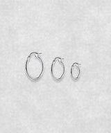 Silver hoop earrings available in three sizes – small, medium and large minimalist hoops