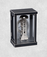 Back view of 14-day mechanical clock with black-painted natural wood frame – exposed movement, pendulum and hourly bell chime
